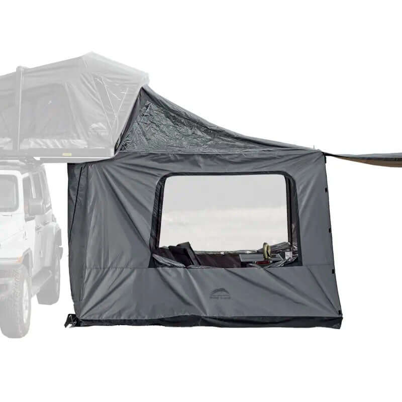 Annesso tende Wild Land Caramina 130 montato su tenda da tetto, offre spazio extra e protezione.