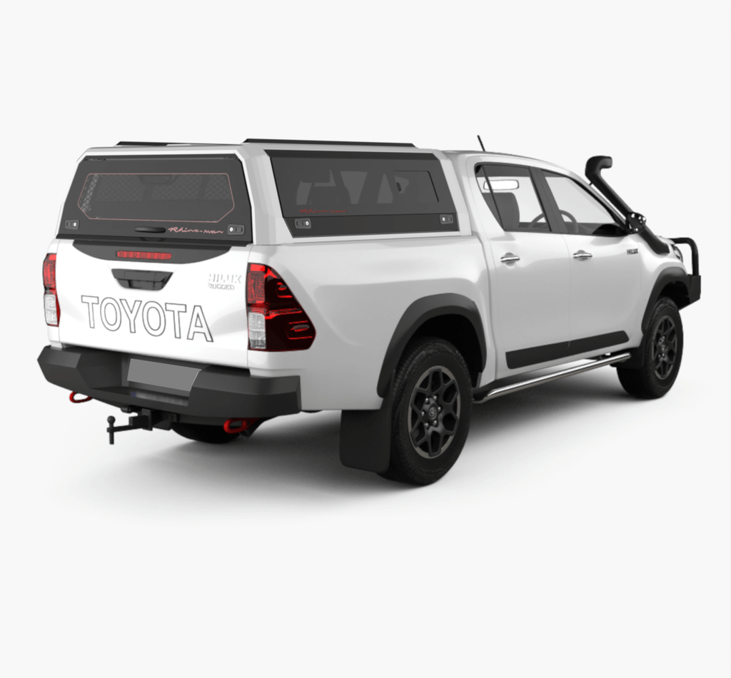 Toyota Hilux bianco con hard top Rhinoman Xtreme e portelli sollevati