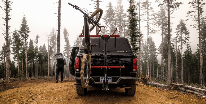 RSI SmartCap EVOd Defender nel bosco con bici sul portellone