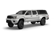 Hard top RSI SmartCap EVOs Sport per Toyota Tacoma 2005–2015 Standard Bed 6', vista anteriore 3/4 su sfondo bianco